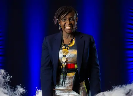Maggie Aderin-Pocock at the Faraday desk in the Royal Institution Theatre