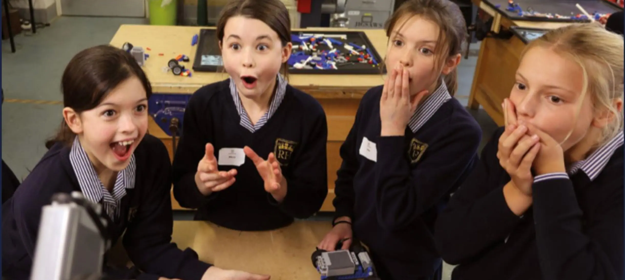 School children look suprised and delighted