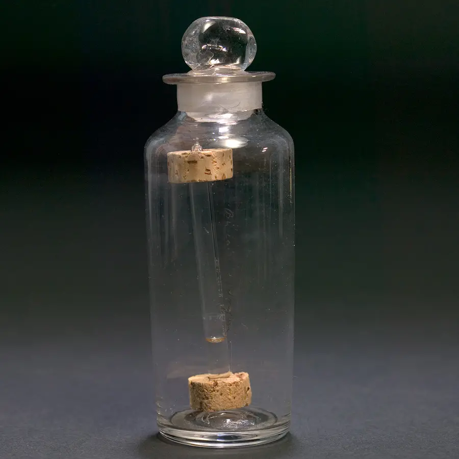 Faraday's Benzene sample in a glass container
