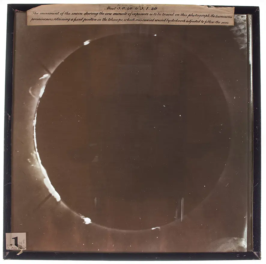 De la Rue's eclipse photograph. We can see, to the left of the Moon looking at the photo, the bright "tentacles of light"