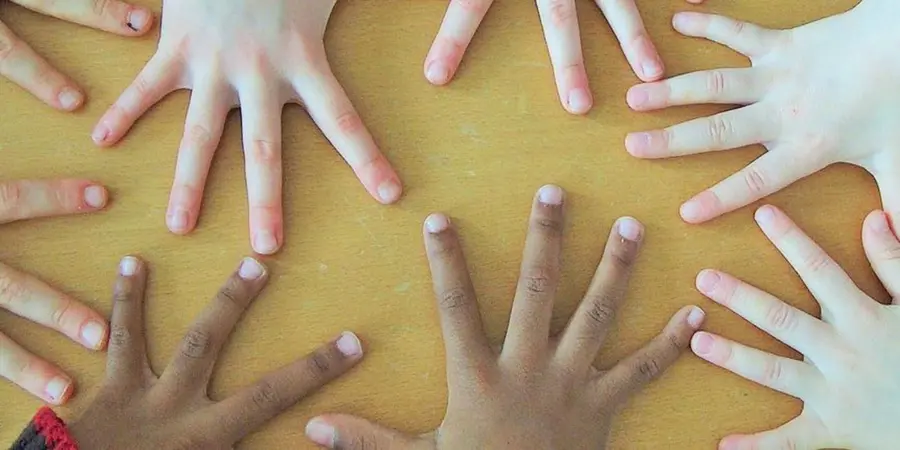 Children's hands on a table