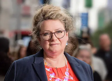 Sophie Scott, with blurred crowd of people in the background