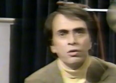 A still of Carl Sagan during his CHRISTMAS LECTURE