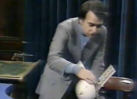 A still of Carl Sagan during his CHRISTMAS LECTURE in 1977