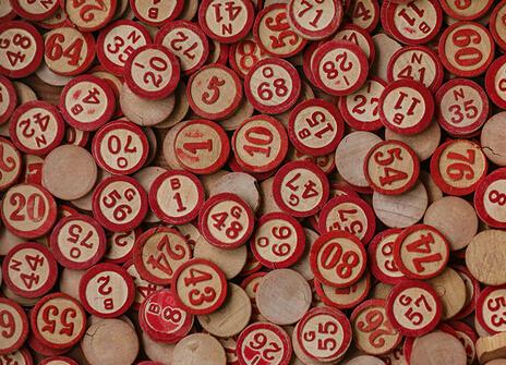 Wooden lottery numbers, stamped with red ink