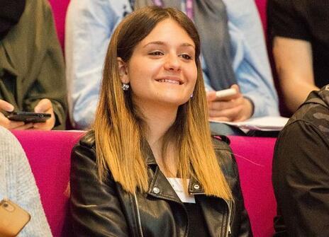 Students enjoying talks in the theatre